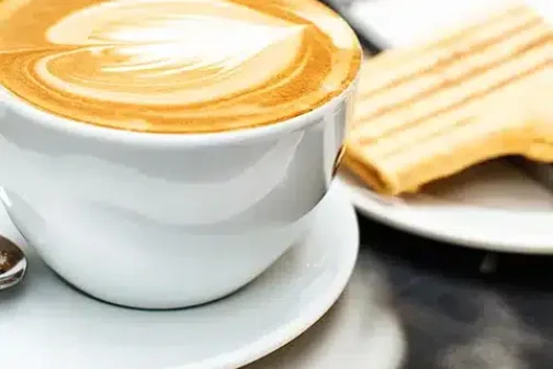 A cup of coffee and a slice of toast